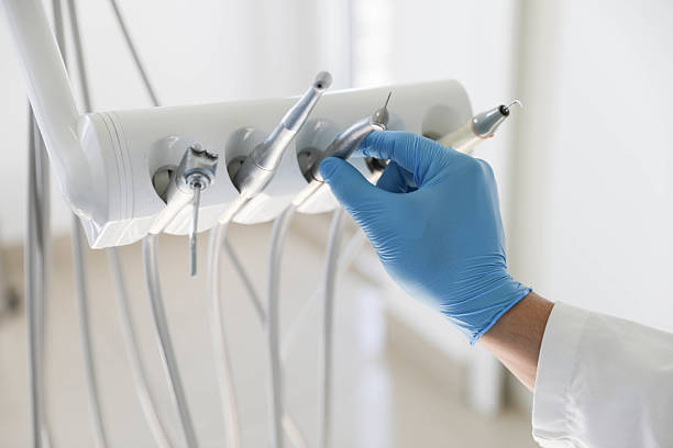 Professional Emergency Dentist technician working in McLeansboro, IL